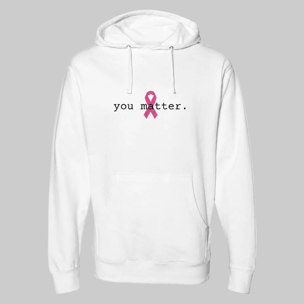 A white pullover hoodie with a front kangaroo pocket and drawstring hood, featuring the text 'you matter.' in black and a pink awareness ribbon printed on the chest on a warm grey background.