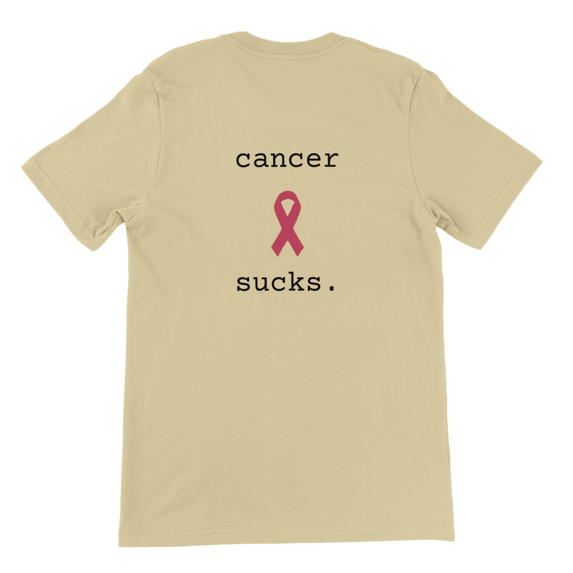 A natural short-sleeve t-shirt shown from the back, featuring the text 'cancer sucks.' in black with a pink awareness ribbon graphic in the center.