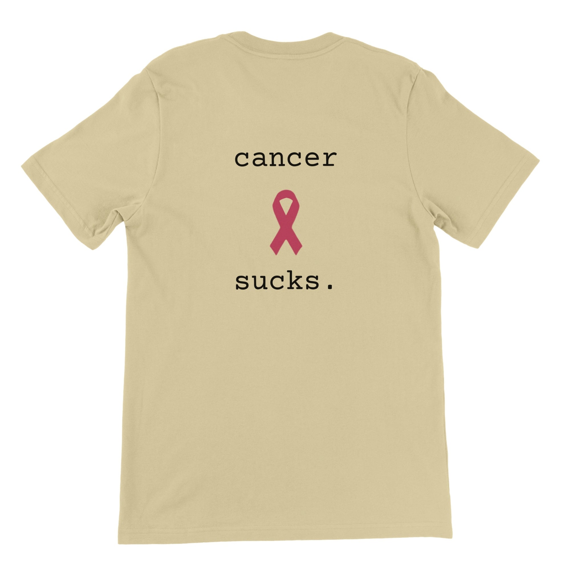 A natural short-sleeve t-shirt shown from the back, featuring the text 'cancer sucks.' in black with a pink awareness ribbon graphic in the center.