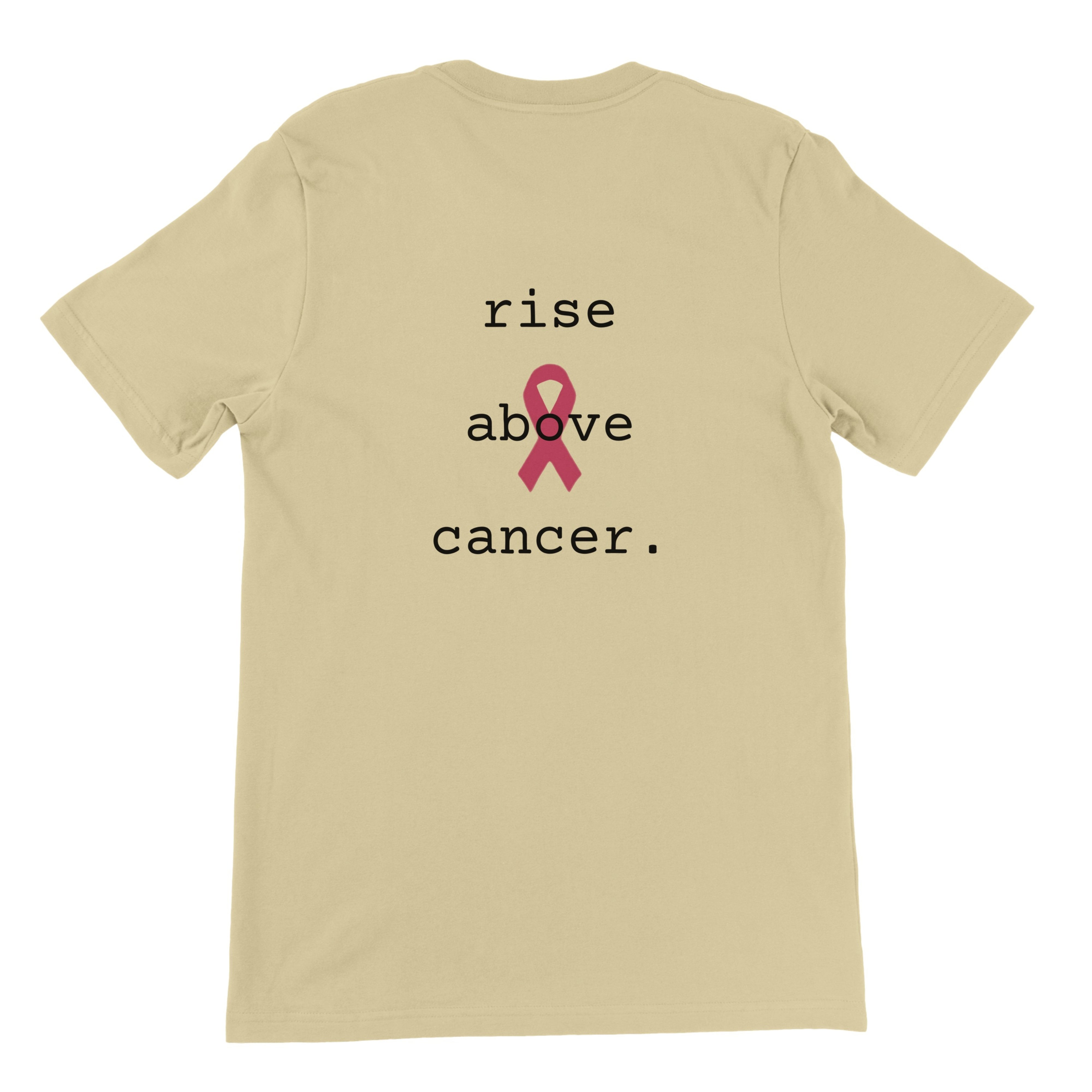 A natural colored short-sleeve t-shirt shown from the back, featuring a graphic print with the words 'rise above cancer.' in black lowercase text and a pink awareness ribbon in the center.