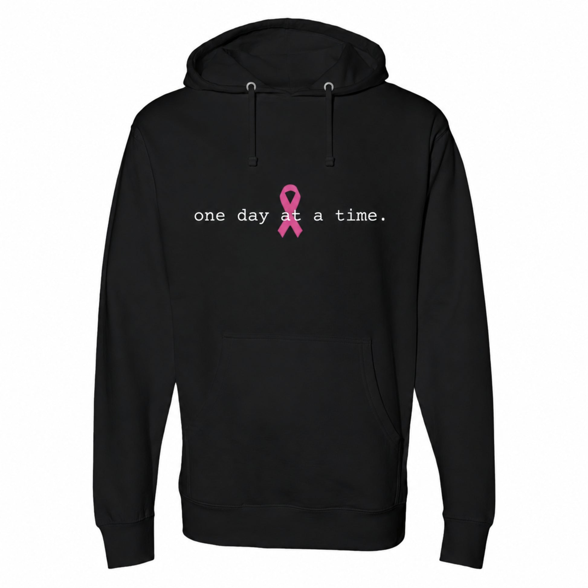 A black pullover hoodie with a front kangaroo pocket and drawstrings, featuring the text 'one day at a time.' in white next to a pink awareness ribbon on the chest.