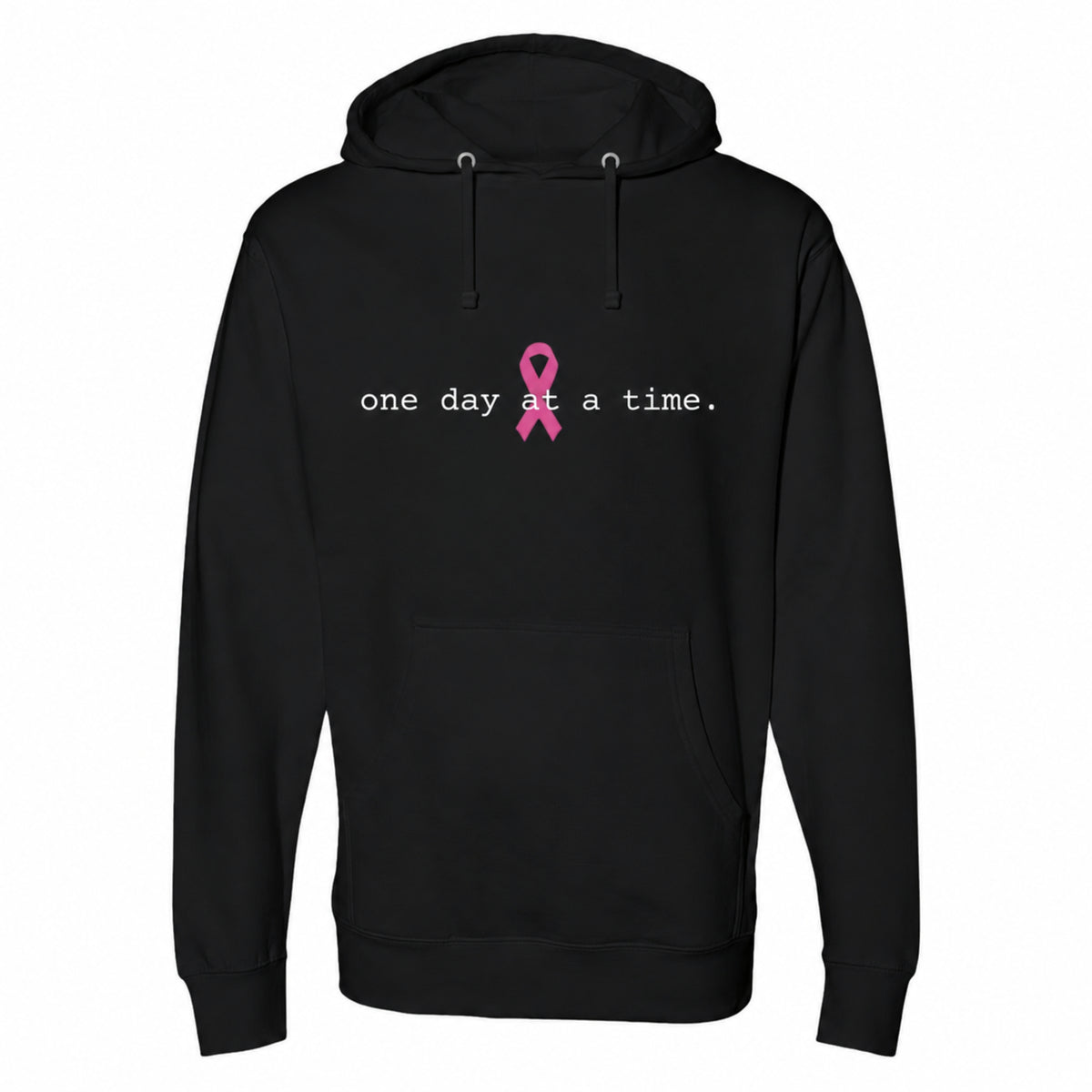 A black pullover hoodie with a front kangaroo pocket and drawstrings, featuring the text 'one day at a time.' in white next to a pink awareness ribbon on the chest.