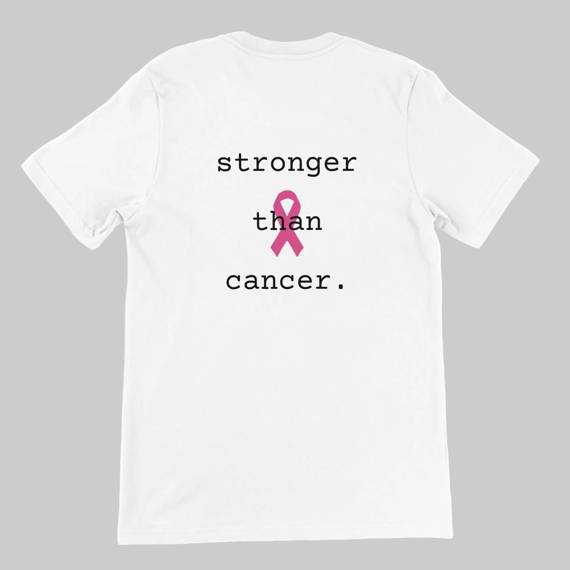 White short-sleeve crewneck t-shirt with the text 'stronger than cancer.' printed in black lowercase letters, featuring a pink awareness ribbon graphic in the center of the chest on a warm grey background