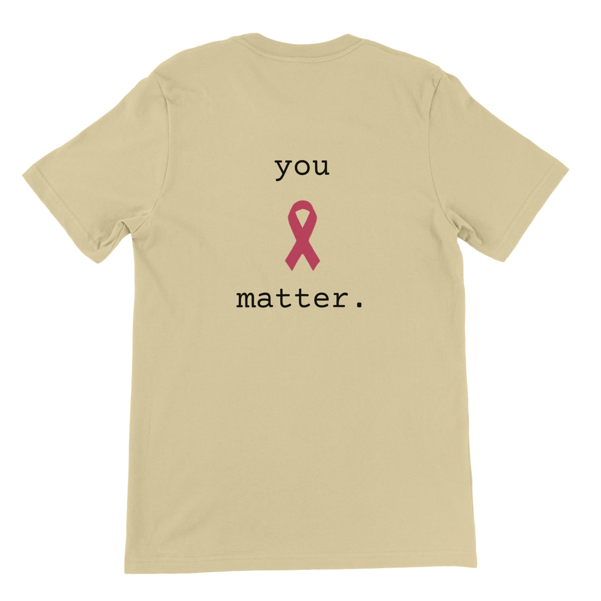 A natural-colored short-sleeve t-shirt shown from the back, featuring the printed text 'you matter.' in black with a pink awareness ribbon in the center.