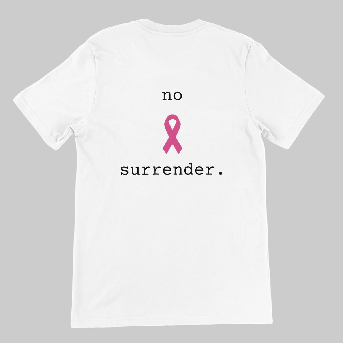 A white short-sleeve crewneck t-shirt with a pink awareness ribbon graphic and the text 'no surrender.' printed on the back.