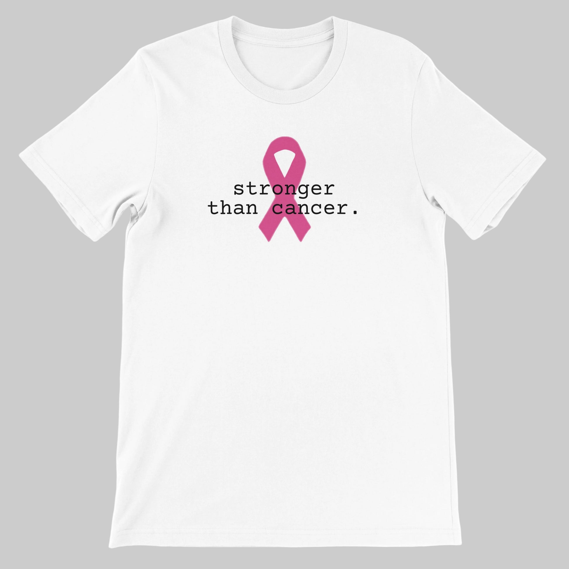 A white short-sleeve crewneck t-shirt featuring a pink awareness ribbon and the printed text 'stronger than cancer.' in black on the chest, displayed against  a warm grey background.