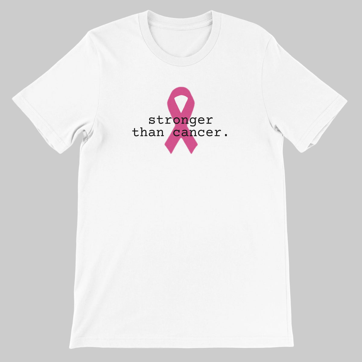 A white short-sleeve crewneck t-shirt featuring a pink awareness ribbon and the printed text 'stronger than cancer.' in black on the chest, displayed against  a warm grey background.