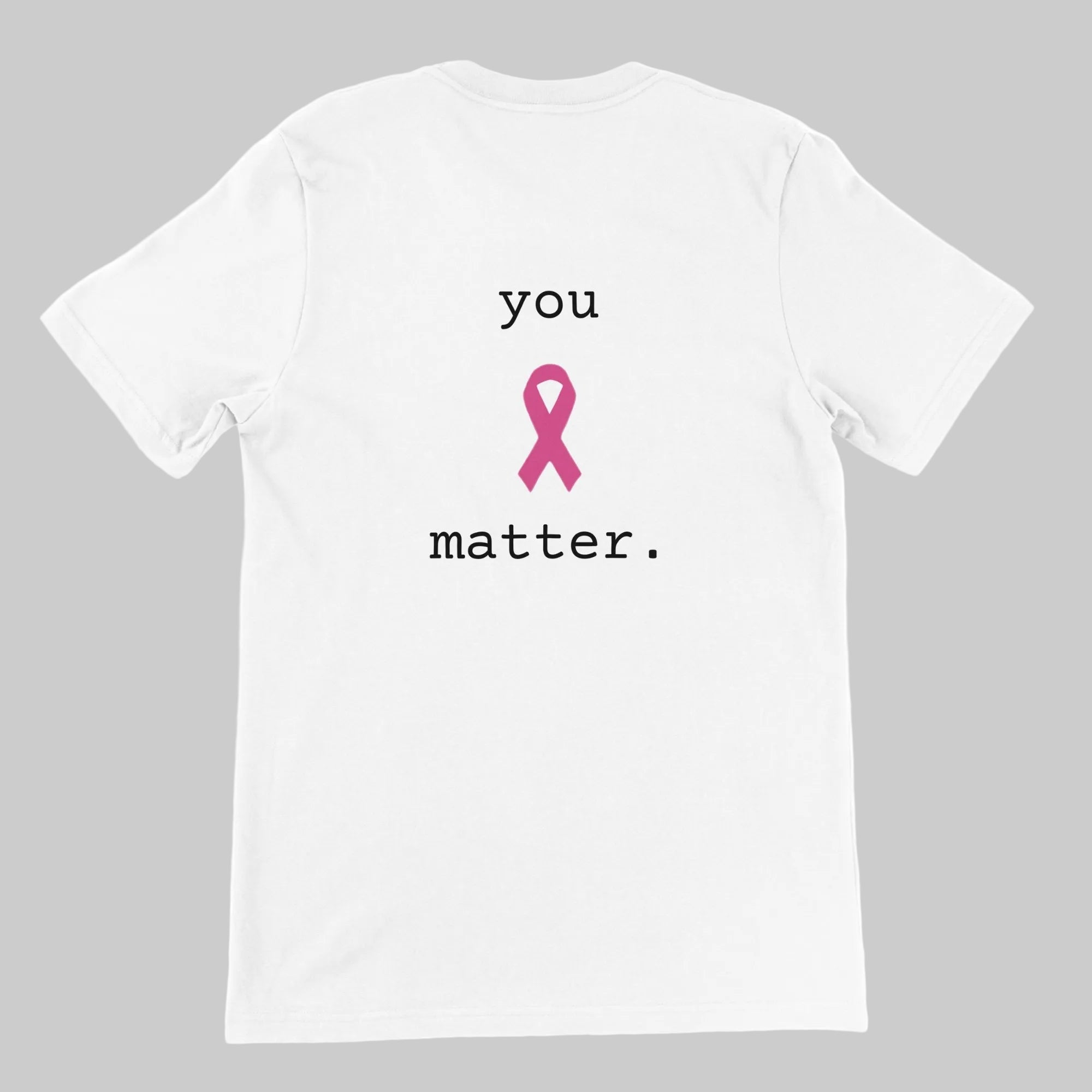 A white short-sleeve t-shirt shown from the back, featuring a pink awareness ribbon graphic in the center with the black text 'you matter.' printed above and below it.
